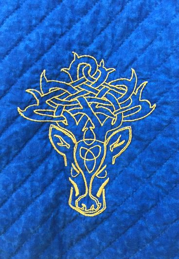 Embroidery, stag head.